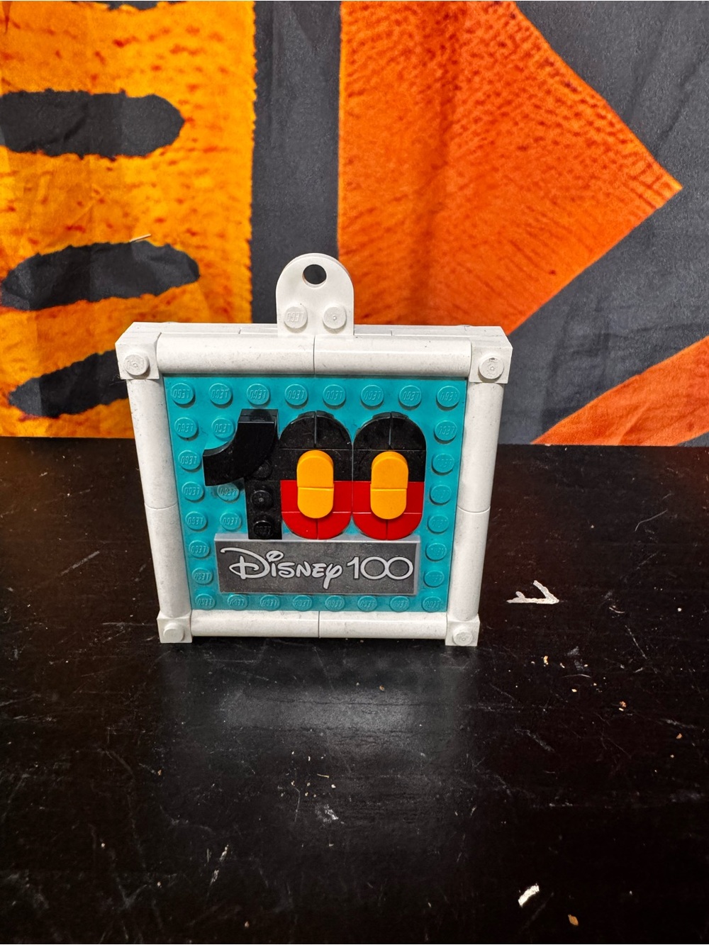 Disney 100 Decorative Brick Plaque - Teal, Black, Red, Yellow, White